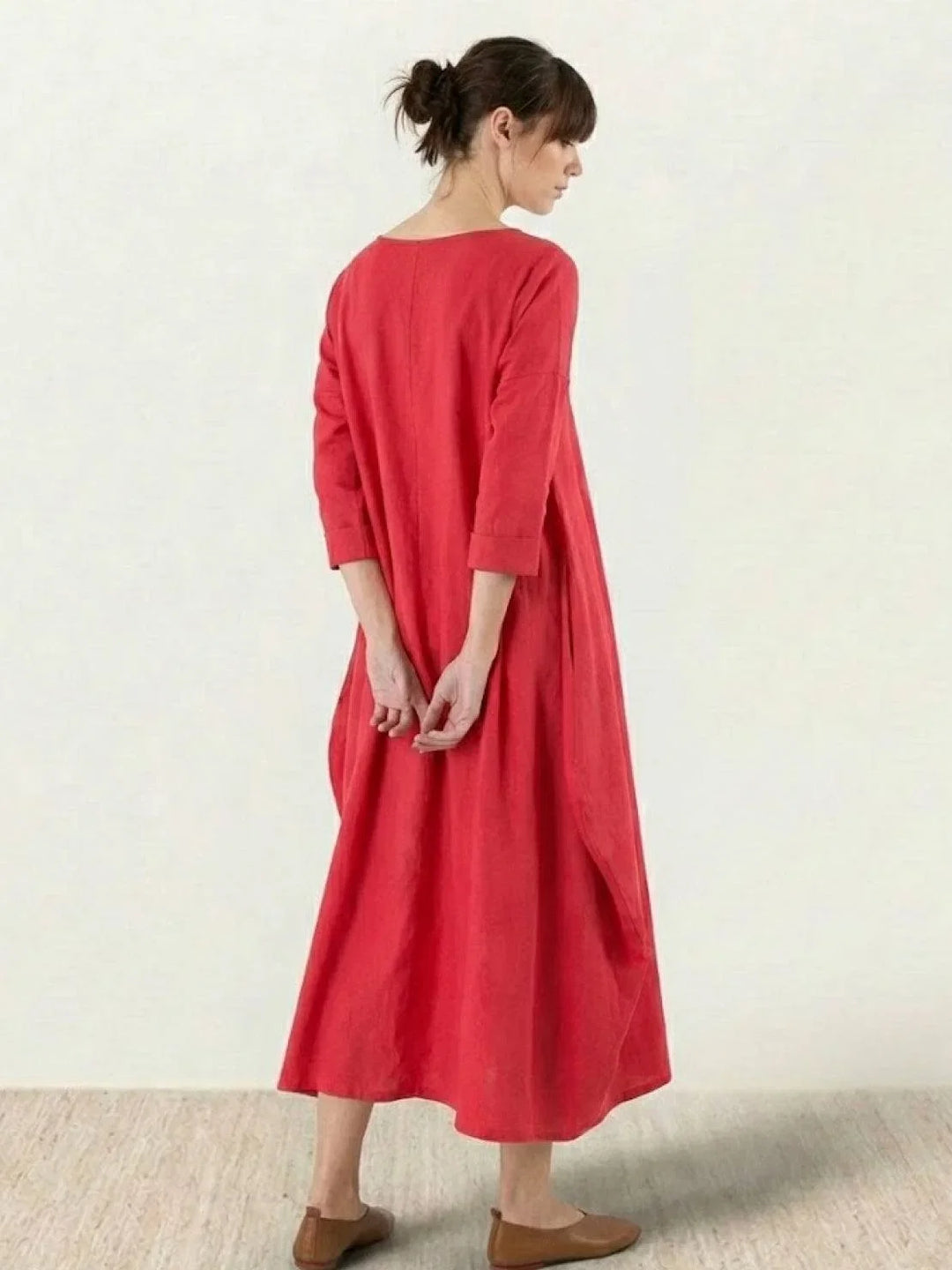 Comfortable women's oversized bohemian maxi dress, 3/4 sleeves, ideal for lounging or travel.
