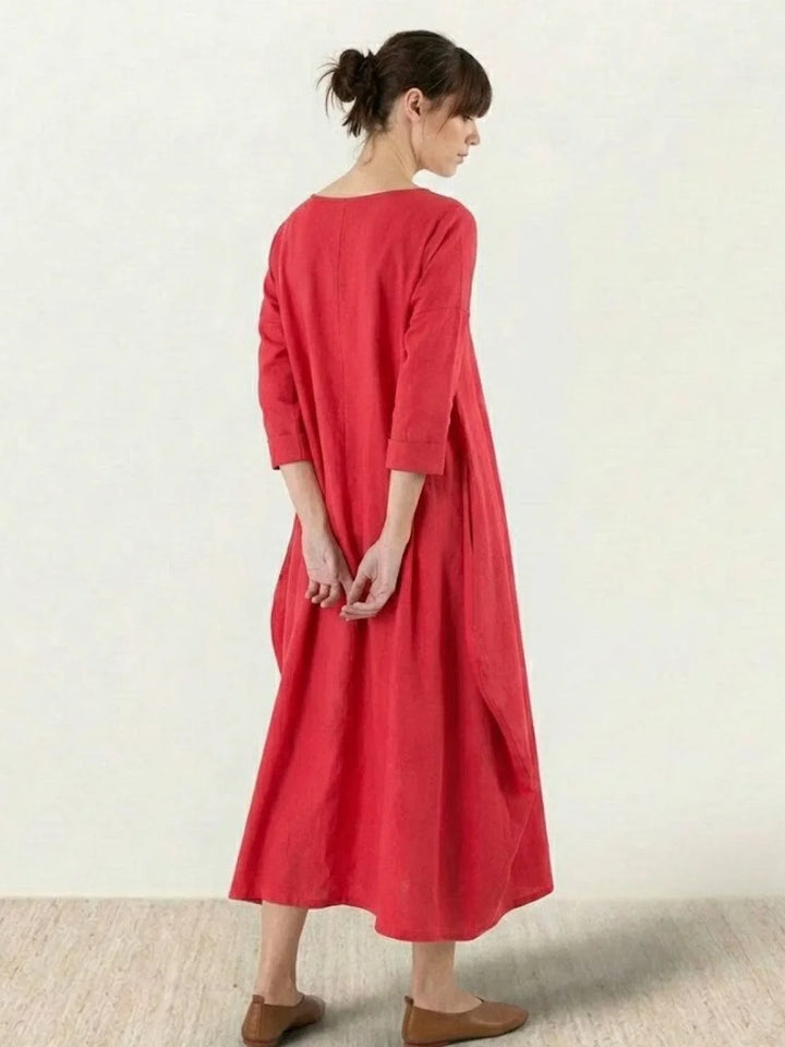 Comfortable women's oversized bohemian maxi dress, 3/4 sleeves, ideal for lounging or travel.