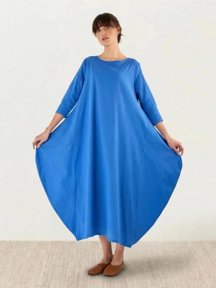 Lightweight women's boho maxi dress, 3/4 sleeves, loose fit, great for beach or casual outings.