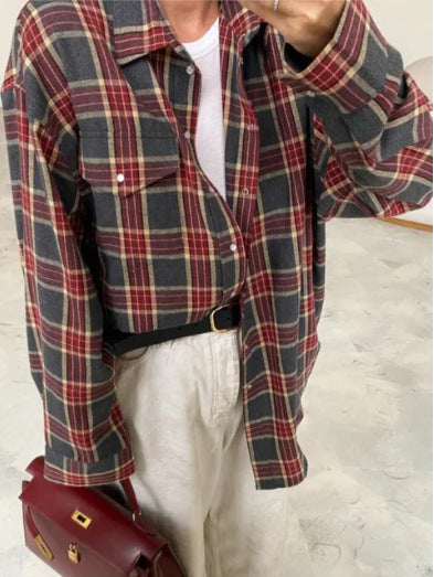 Women's casual checked shirt, long sleeve, button-down, a staple for ladies' fashion.