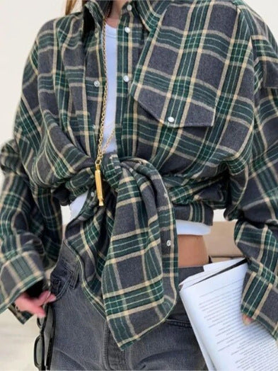 Oversized women's checked button-down blouse, a trendy and casual everyday top.