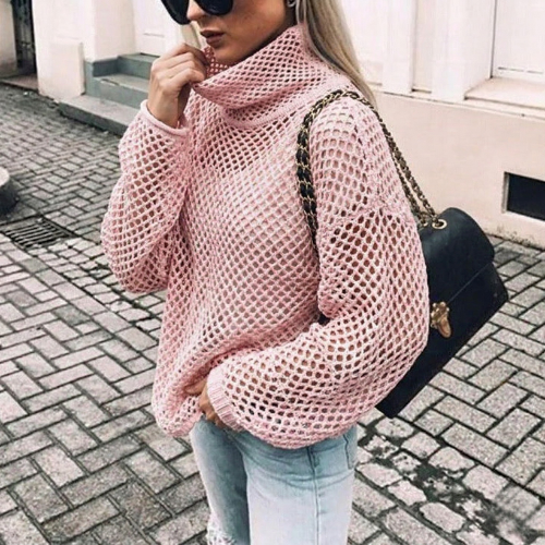 Cozy women's oversized turtleneck jumper, perfect for casual layering & comfortable winter fashion. Chunky knit style.