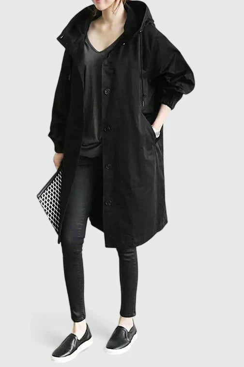 Versatile women's oversized coat, ideal for casual and elegant fall/winter fashion. Comfortable outerwear.