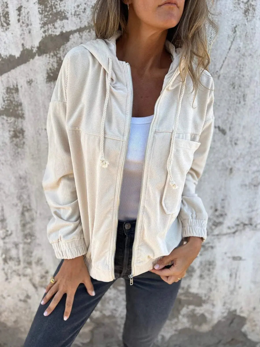 Ladies' relaxed fit corduroy quilted hooded jacket. Oversized zip-up style for cozy fall & spring casual outerwear looks.