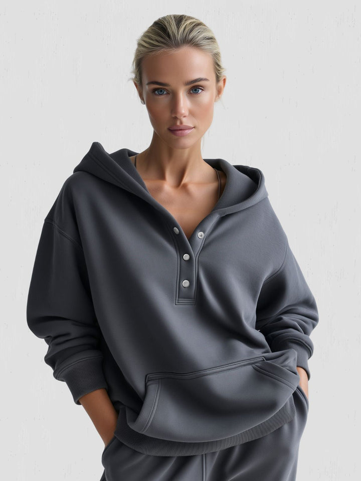 Women's oversized cotton snap-fit hoodie in a relaxed fit for ultimate comfort.