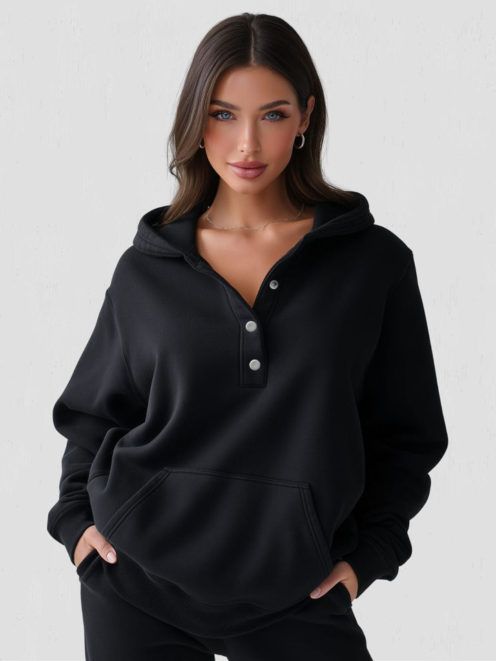 Stylish women's oversized hoodie with easy snap-fit closure, ideal for cozy apparel.
