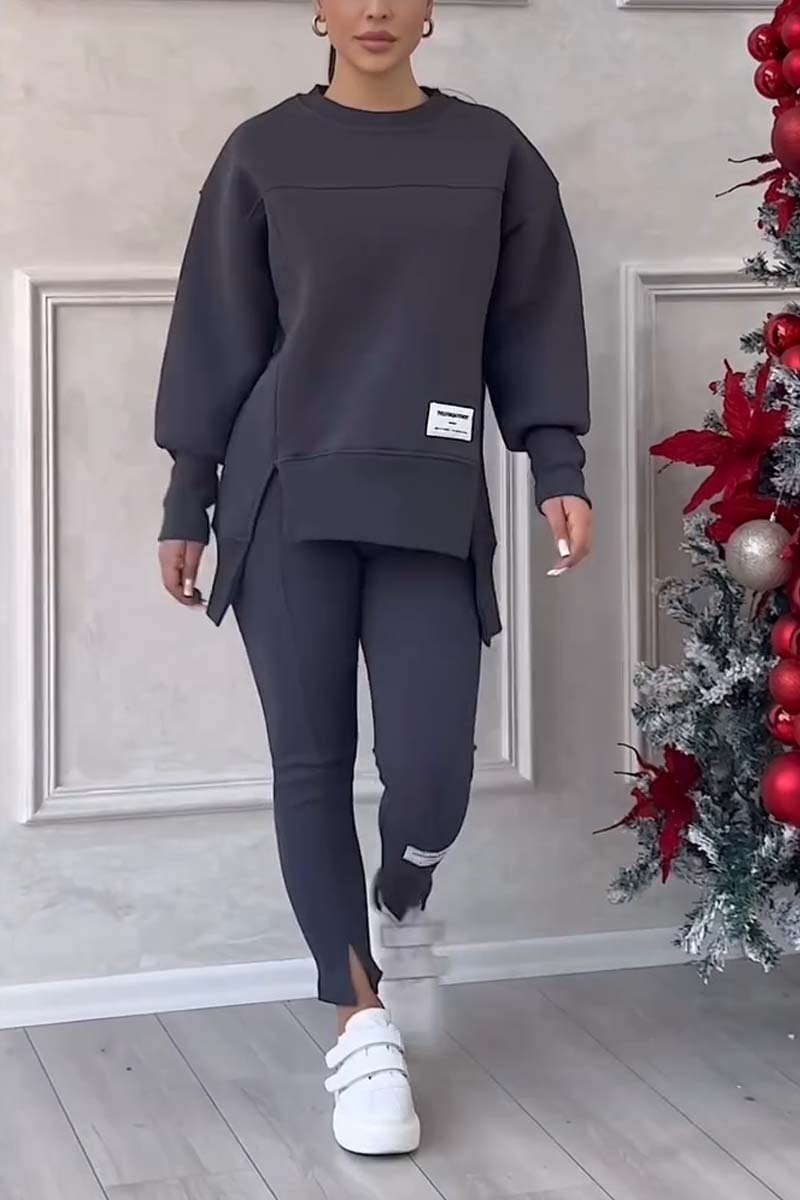 Stylish women's oversized two-piece loungewear set: casual long sleeve crew neck sweater & matching leggings.