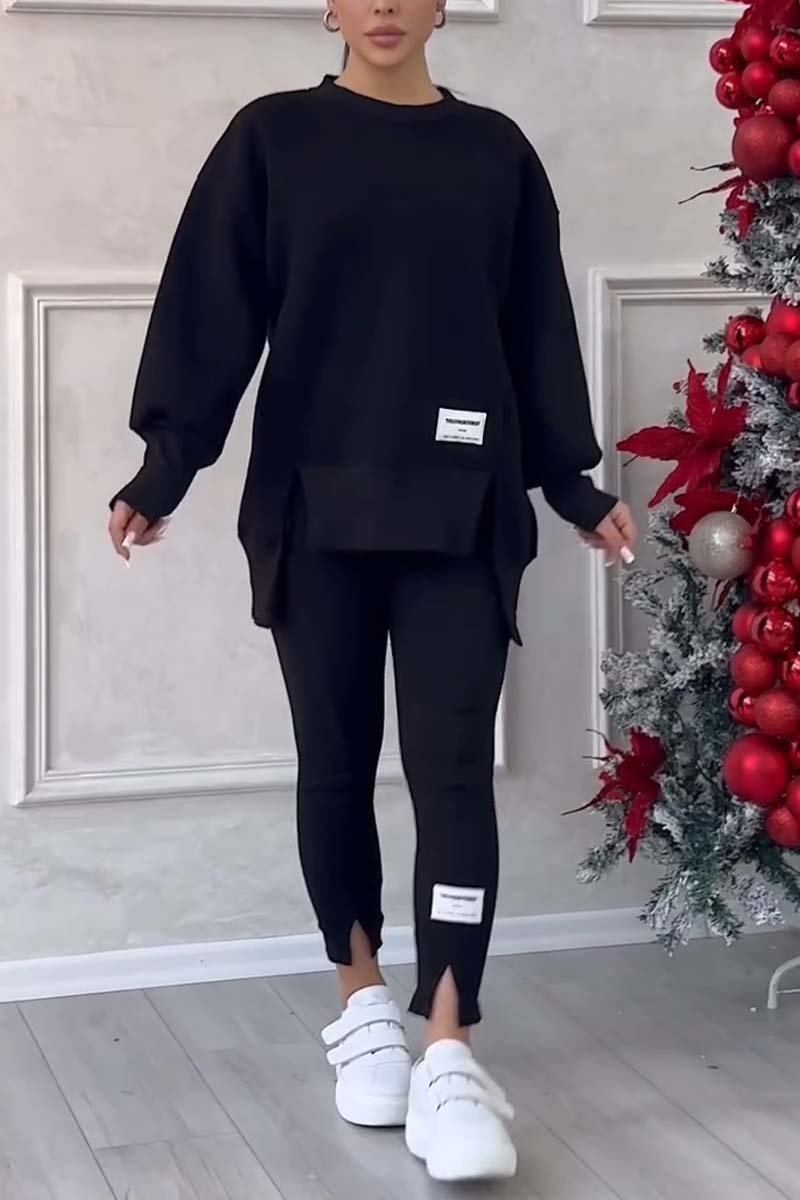 Two-piece women's oversized loungewear: relaxed fit crew neck long sleeve sweater & soft elastic-waist leggings.