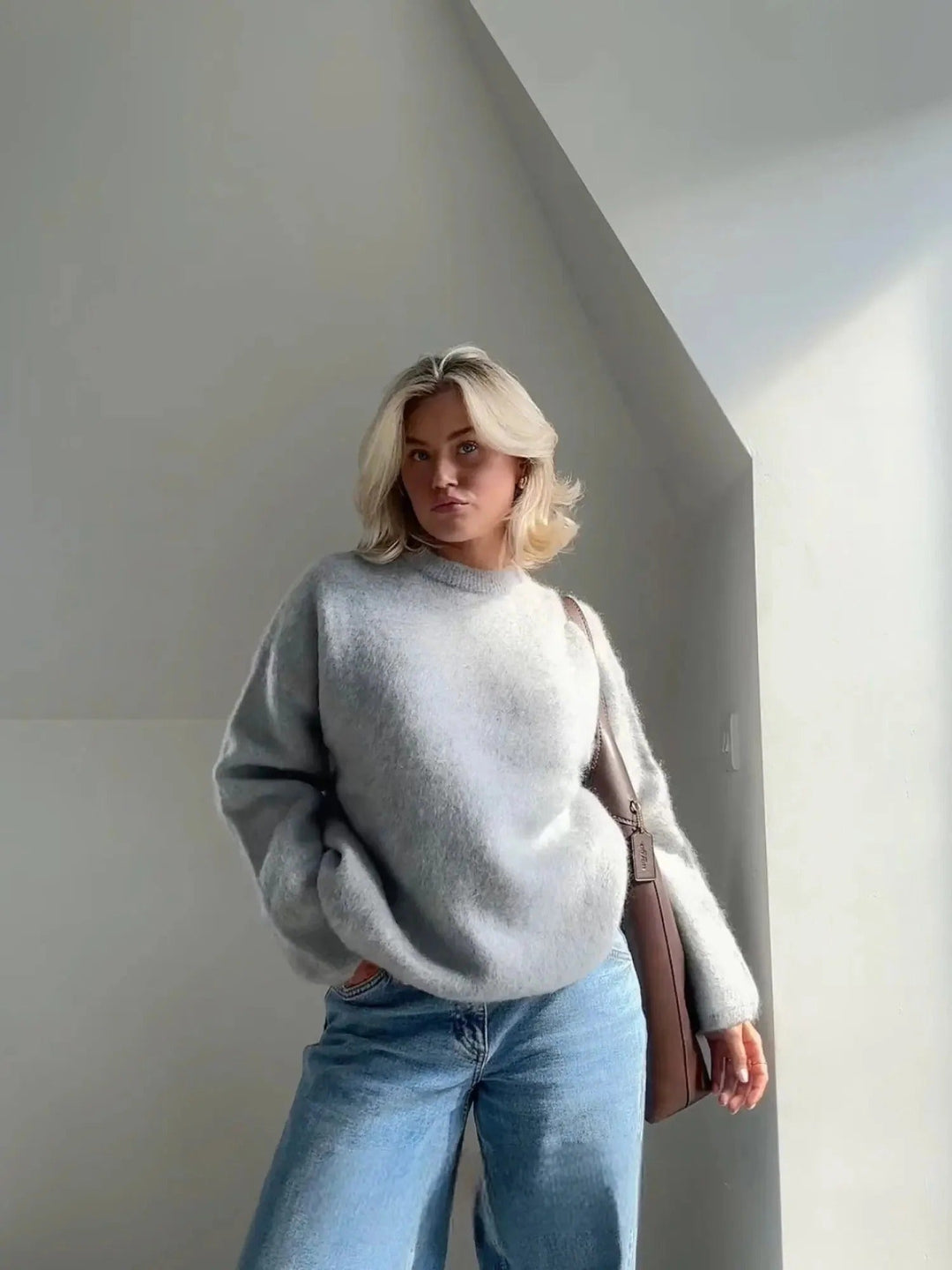 Women's oversized crew neck sweater for cozy warmth. Perfect for winter fashion & autumn style.