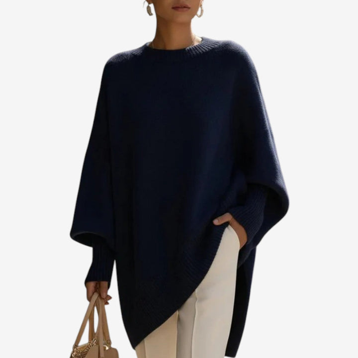 Women's casual oversized sweater, batwing sleeves, crew neck, asymmetric hem, ideal for comfortable daily wear.