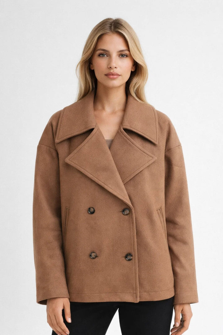 Women's oversized double-breasted short coat in a stylish design, perfect for smart casual fall fashion.