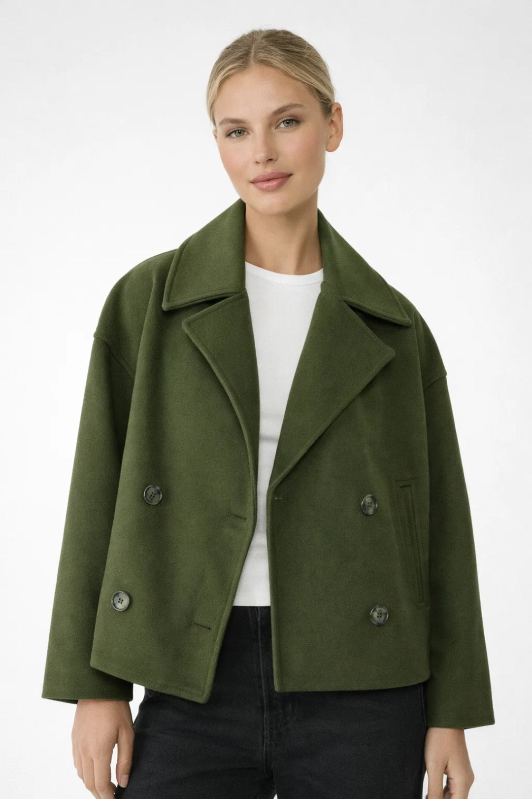 Fashionable women's double-breasted short coat. This oversized jacket offers a chic smart casual look.