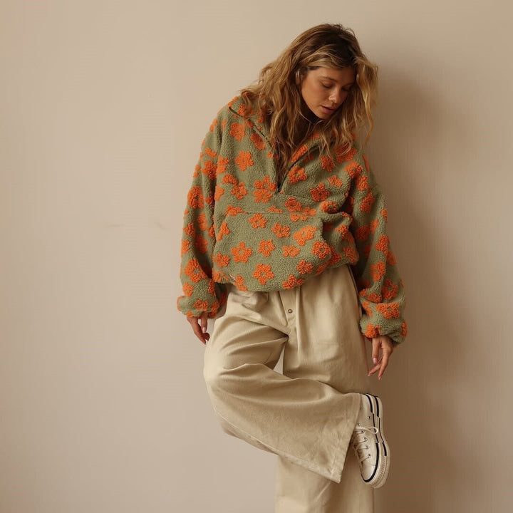 Women's half-zip floral oversized sweater jacket, long sleeve and hip-length for cozy style.
