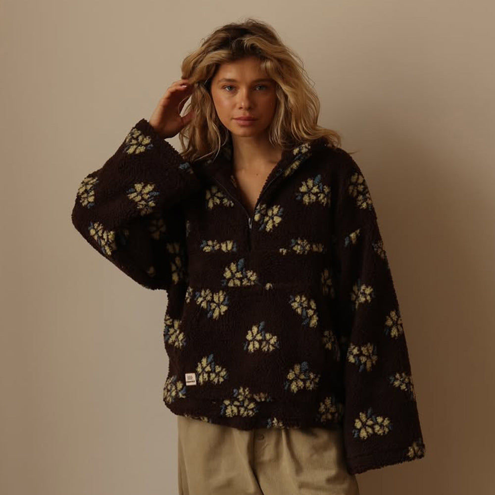 Fashionable women's oversized floral half-zip sweater jacket, offering a relaxed fit for daily wear.