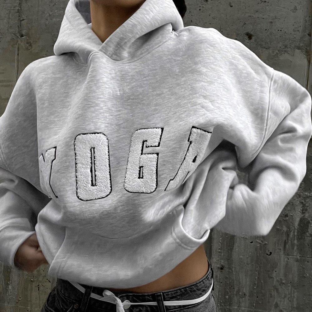 Women's oversized gray yoga print sweatshirt, perfect for athletic comfort & casual style.