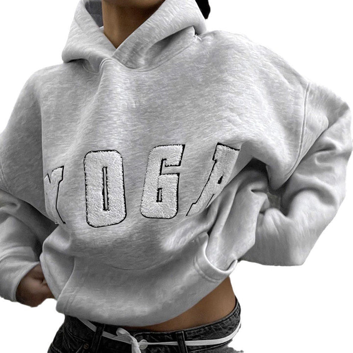 Women's gray yoga print athletic sweatshirt. Comfortable oversized hoodie for casual, active, and everyday loungewear.