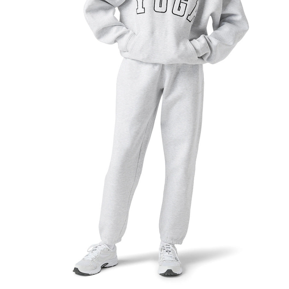 Stylish gray women's sweatshirt with intricate yoga graphic print, offering comfort for active lifestyles.