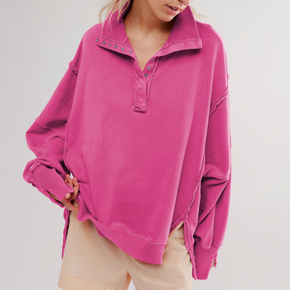 Comfortable women's oversized henley pullover, a relaxed fit long-sleeve top for easy, versatile everyday style.