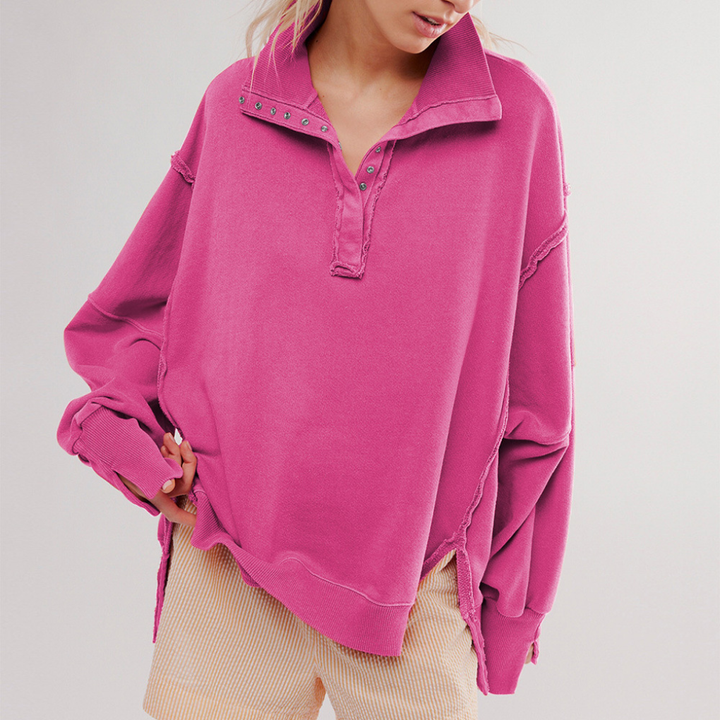 Comfortable women's oversized henley pullover, a relaxed fit long-sleeve top for easy, versatile everyday style.