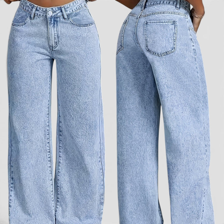Women's oversized high waist light blue jeans, wide leg fit for casual wear & travel comfort.