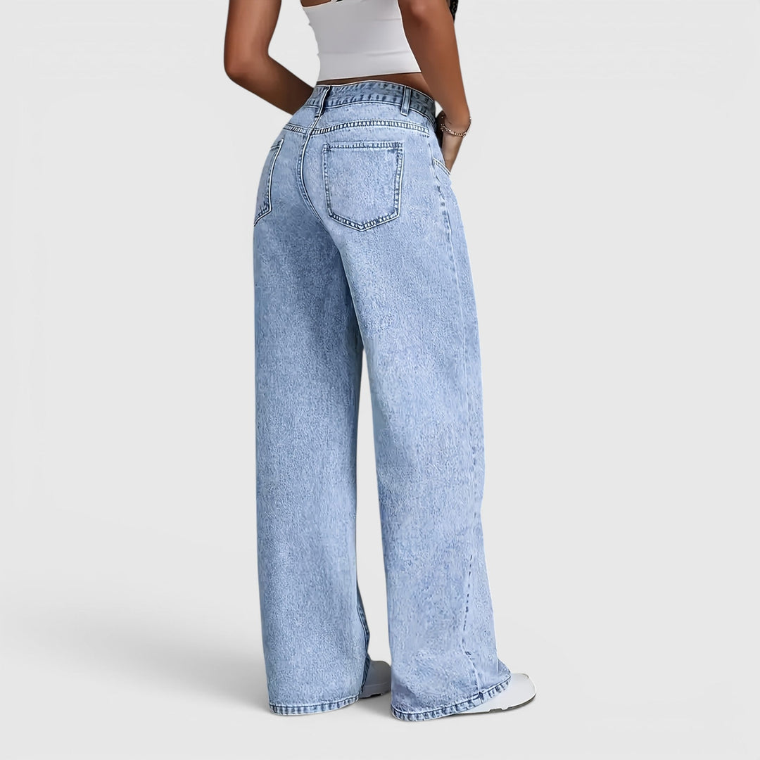 Stylish women's baggy high waist light blue denim jeans, perfect for workwear & comfortable travel.