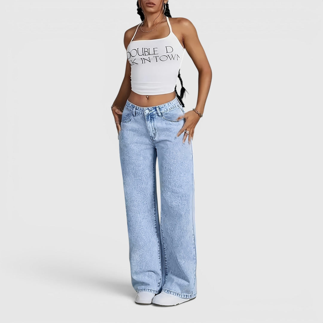Comfortable women's oversized high waist wide leg jeans in light blue, perfect for travel & everyday.