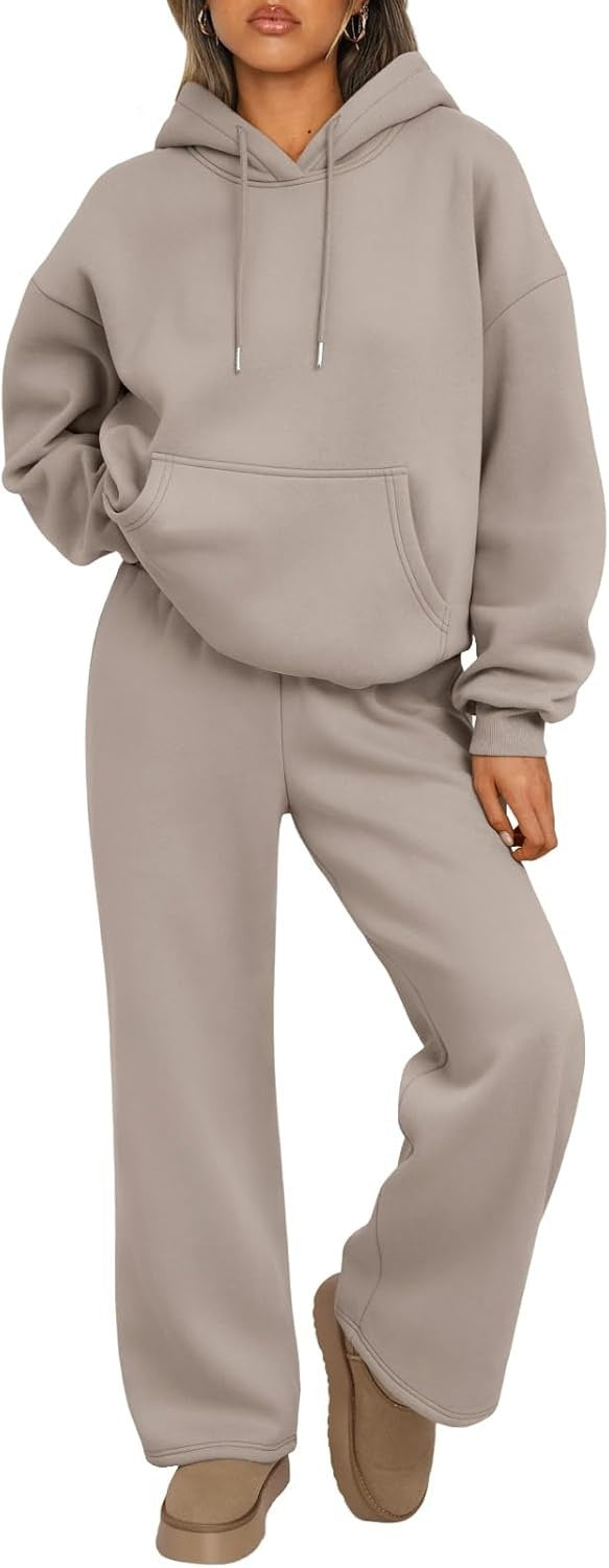 Oversized hooded sweatshirt paired with coordinating joggers, ideal for lounging.