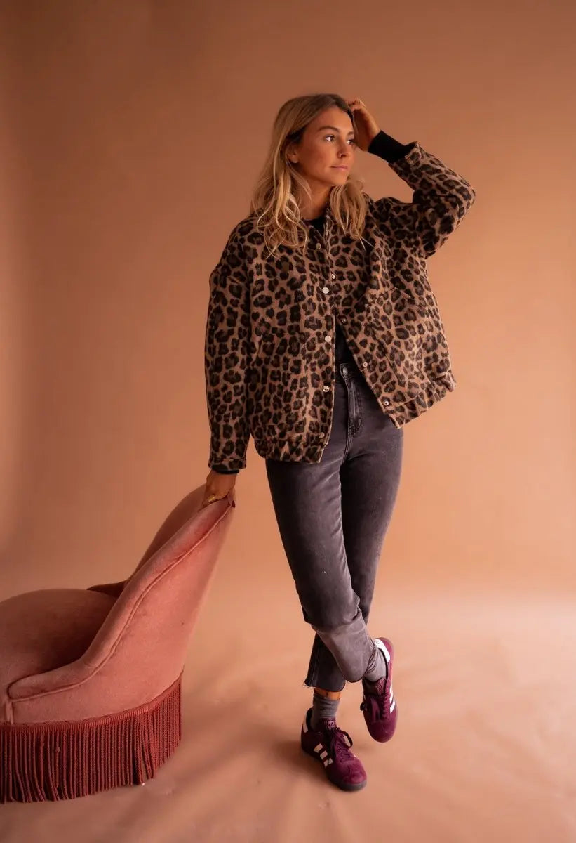 Statement women's oversized quilted jacket in bold leopard print, a must-have piece of animal print outerwear.