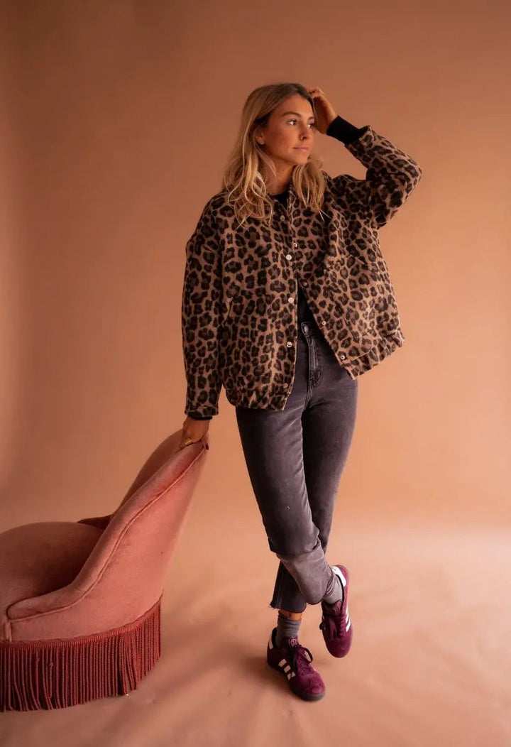 Statement women's oversized quilted jacket in bold leopard print, a must-have piece of animal print outerwear.