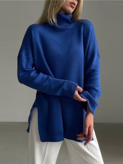 Chic women's oversized sweater with a warm turtleneck and a fashionable long cut with a subtle side slit.