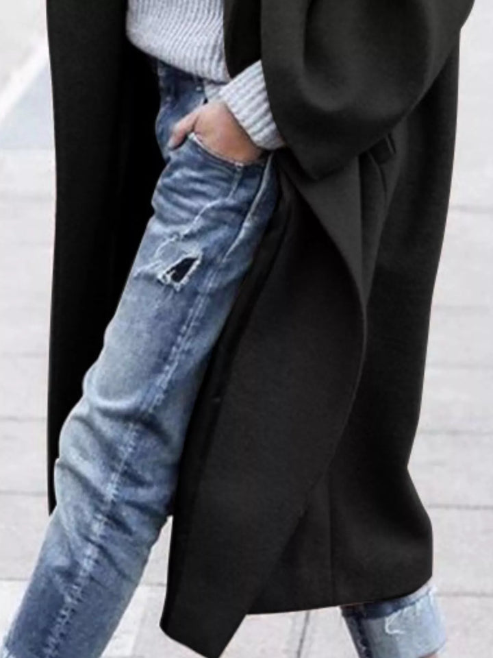 White women's oversized long winter coat, an elegant outerwear choice for ultimate comfort.