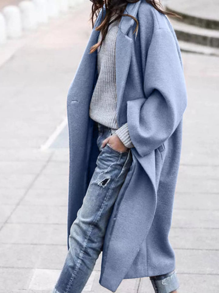 Relaxed fit oversized long winter coat for women, single-breasted and fashion-forward.