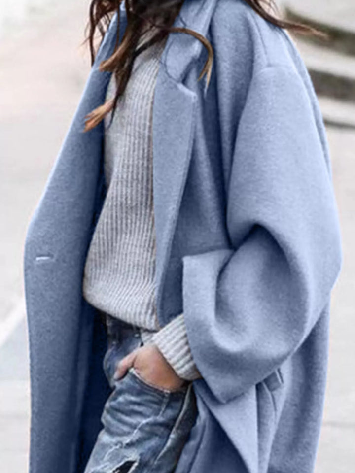 Warm women's oversized long winter coat, ultimate comfort outerwear for cold weather.