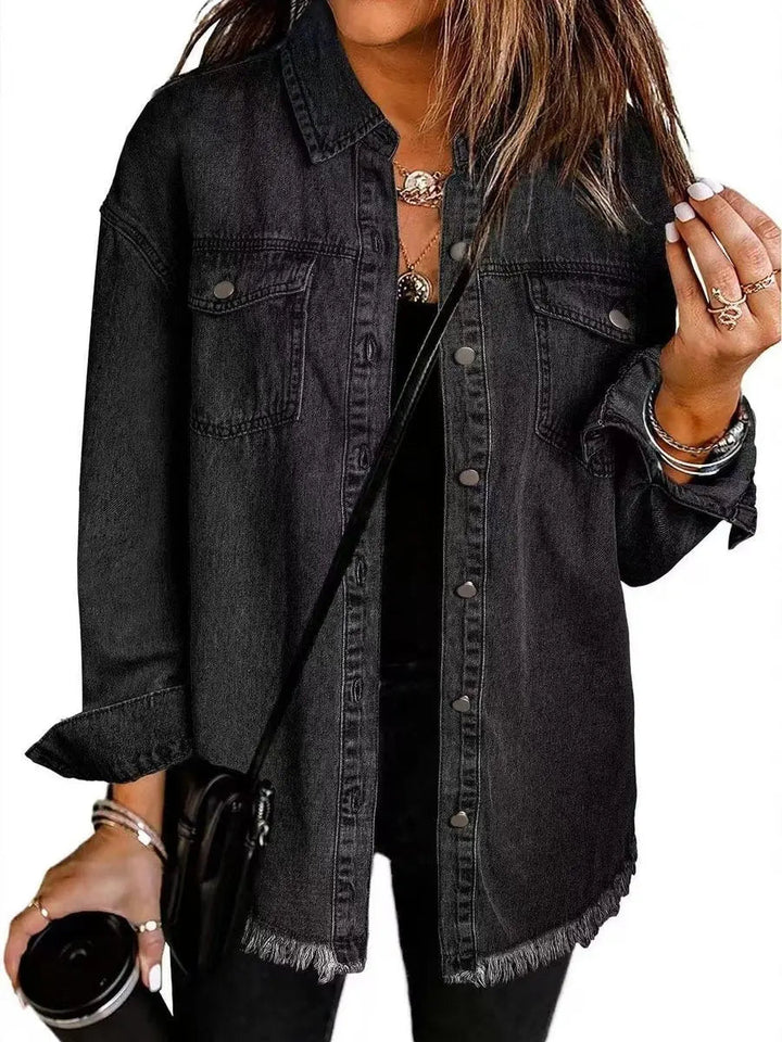 Women's oversized longline jacket with raw hem and snap buttons. Casual, stylish outerwear.