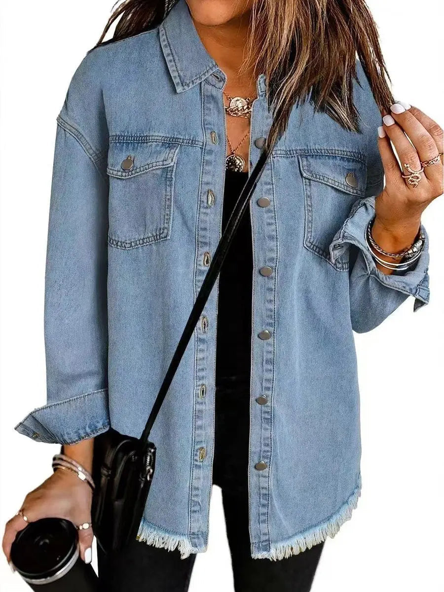 Loose fit women's longline jacket featuring a trendy raw hem and practical snap button closure.
