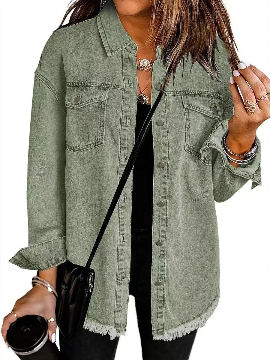 Snap button women's longline jacket with oversized fit and distressed raw hem. Versatile casual outerwear.