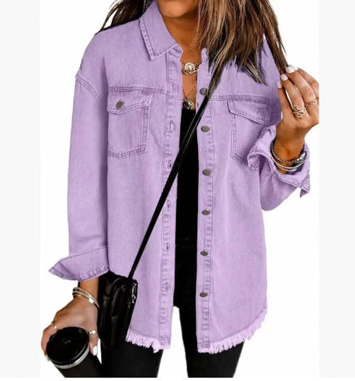 Oversized longline women's jacket with functional snap buttons, a chic raw hem, and a relaxed fit.