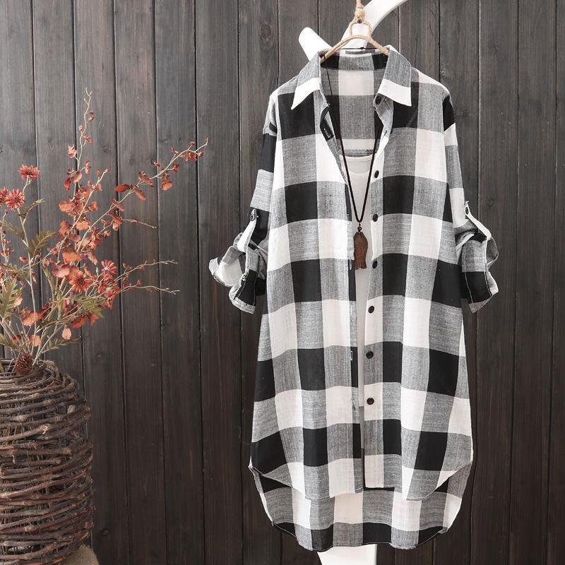 Women's oversized longline plaid button-up shirt, perfect for versatile casual wear and stylish layering.