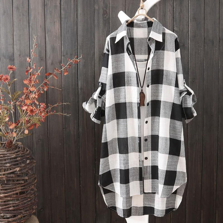 Women's oversized longline plaid button-up shirt, perfect for versatile casual wear and stylish layering.