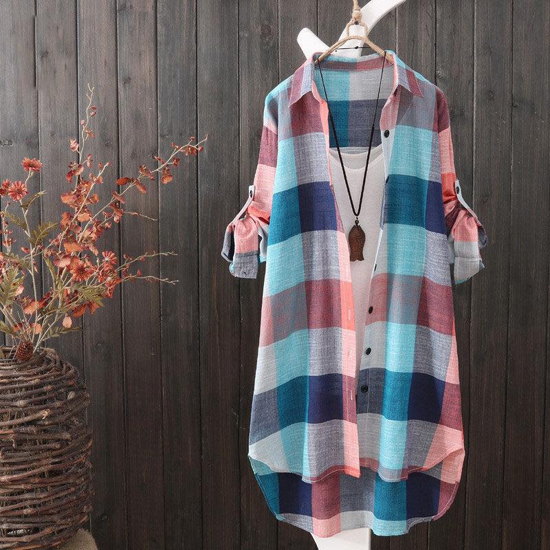 Stylish women's longline plaid button-up shirt, an oversized layering piece for fall and spring fashion.