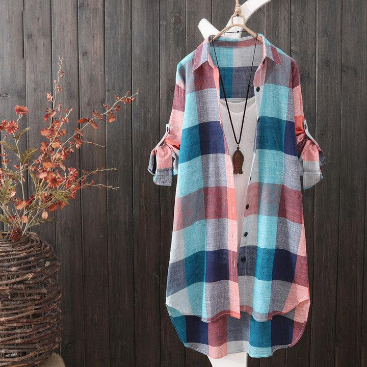 Stylish women's longline plaid button-up shirt, an oversized layering piece for fall and spring fashion.