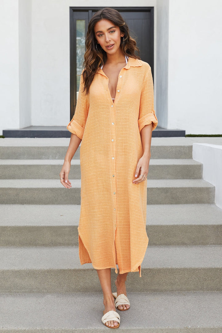 A must-have oversized maxi shirt dress with stylish rolled sleeves