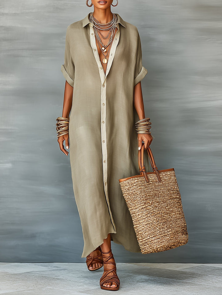 Women's oversized maxi shirt dress with short sleeves and full button front, perfect for casual wear.