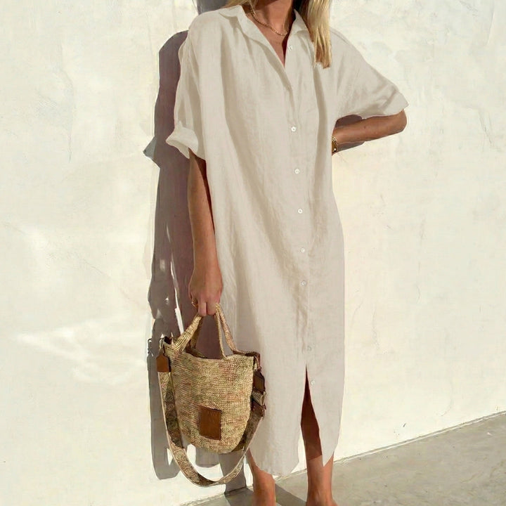 Casual women's oversized midi shirt dress with short sleeves. A versatile, comfy spring & summer fashion staple.