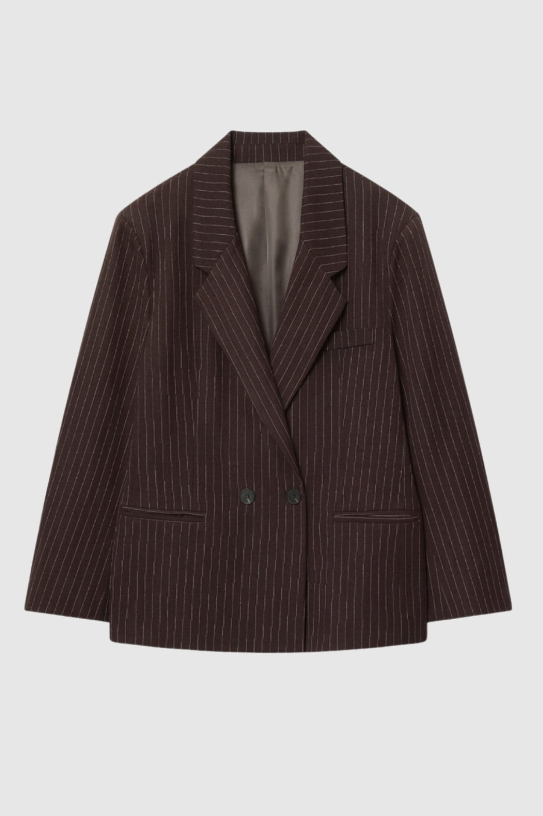 Stylish women's oversized pinstripe blazer. Double-breasted jacket with long sleeves, ideal for business attire.