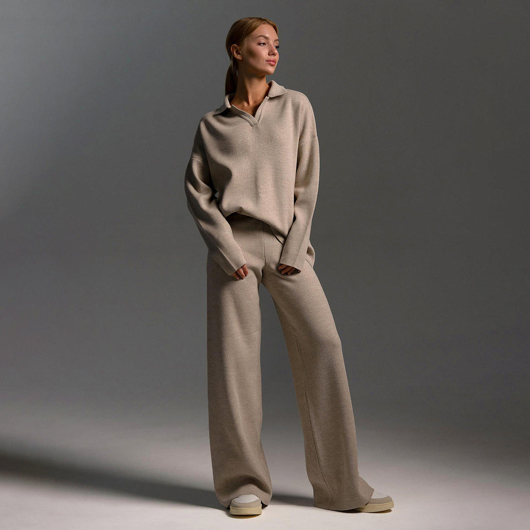 Modern women's oversized polo and wide leg trousers lounge set, a versatile and comfortable two-piece outfit.
