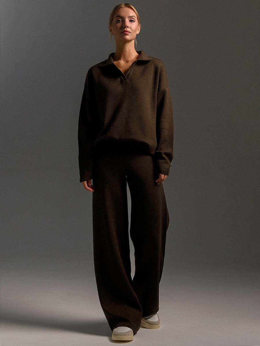 Chic women's matching loungewear set: oversized polo and wide leg trousers for versatile, stylish comfort.
