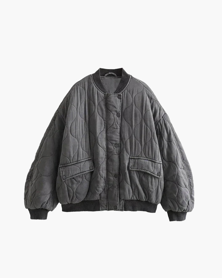 Women's oversized quilted bomber jacket, perfect for stylish fall and winter outerwear.