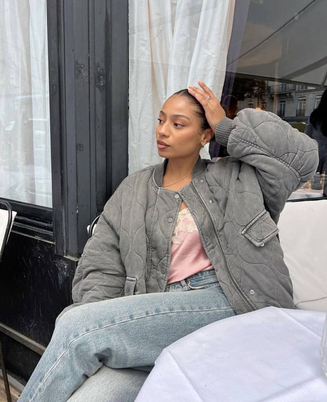 Stylish oversized quilted bomber jacket for women, a must-have piece for fall fashion.