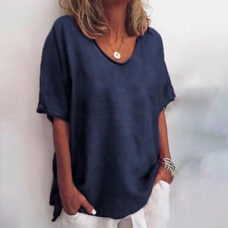 Everyday women's short sleeve blouse. Oversized, V-neck top offering effortless style and comfort for ladies.